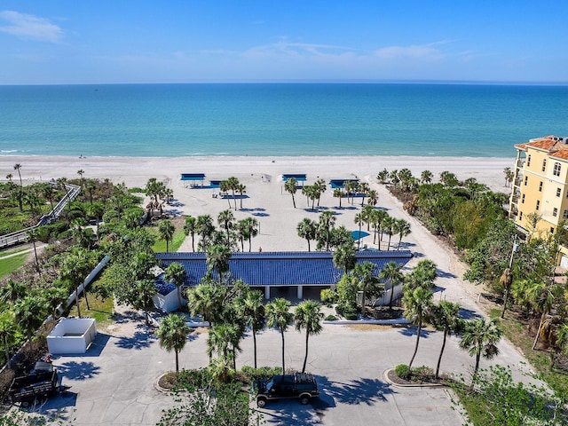 drone / aerial view with a view of the beach and a water view