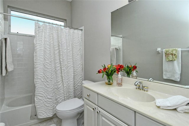 full bathroom featuring tile patterned flooring, vanity, toilet, and shower / bathtub combination with curtain