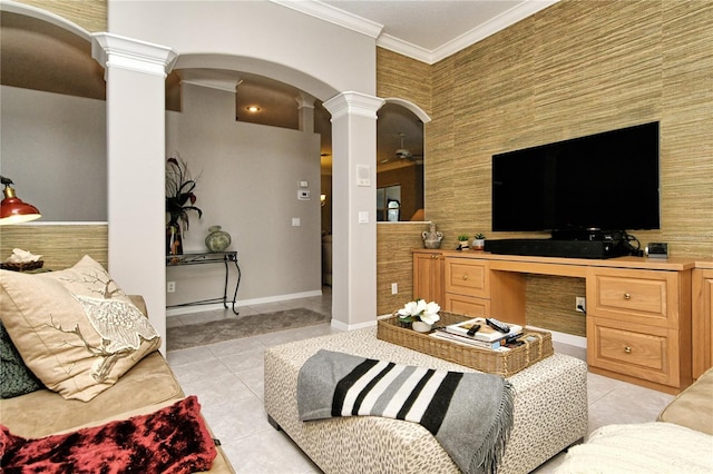 living room featuring light tile patterned floors, crown molding, and decorative columns