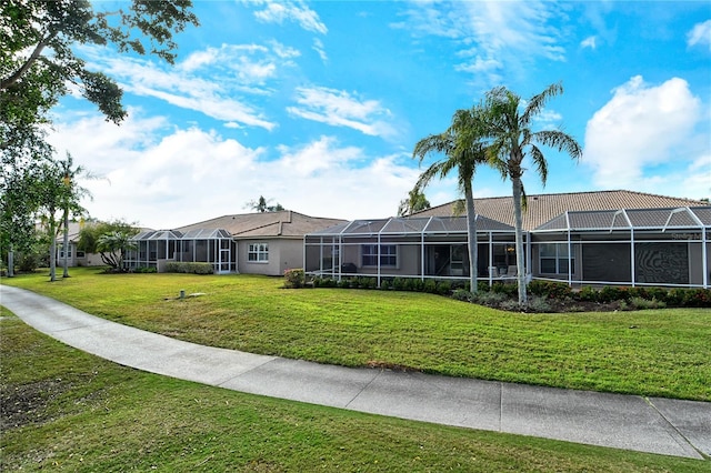 view of property's community featuring a yard