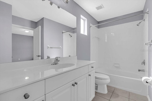 full bathroom featuring tile patterned floors, vanity,  shower combination, and toilet