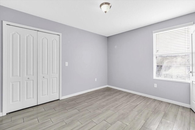 unfurnished bedroom featuring a closet