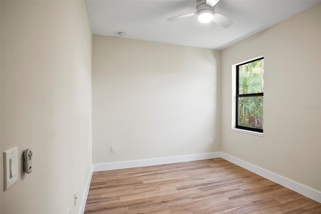 unfurnished room with ceiling fan and light hardwood / wood-style floors