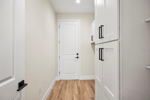 hallway featuring light hardwood / wood-style flooring