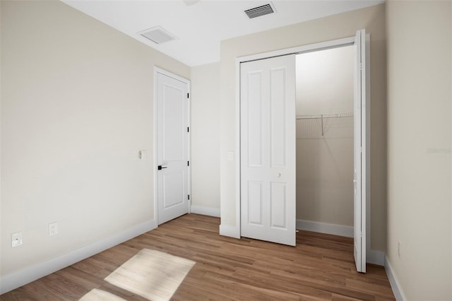 unfurnished bedroom featuring light hardwood / wood-style flooring