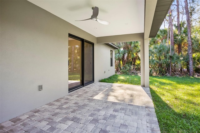 view of patio / terrace featuring ceiling fan