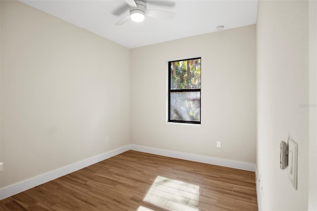 empty room featuring ceiling fan and wood-type flooring