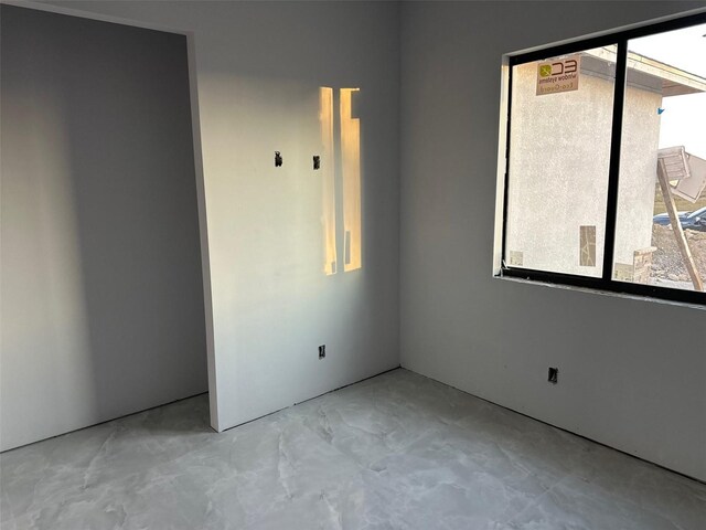 unfurnished bedroom with a closet