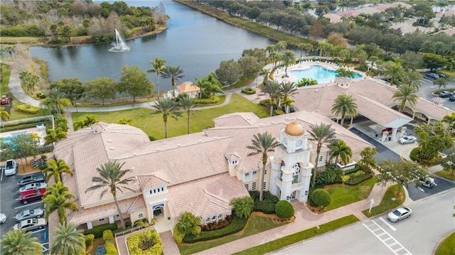 birds eye view of property featuring a water view