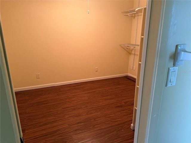 interior space with dark hardwood / wood-style floors