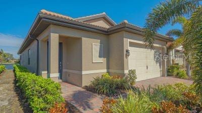 view of side of property featuring a garage