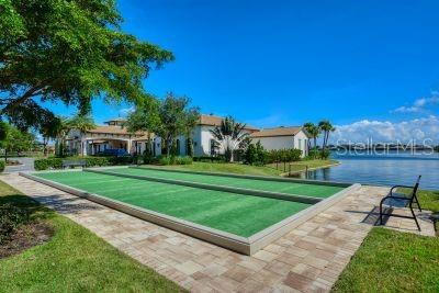 view of home's community featuring a water view