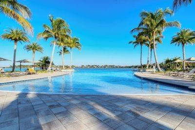 view of pool with a water view