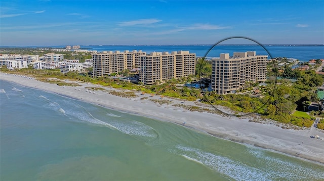 aerial view with a beach view and a water view