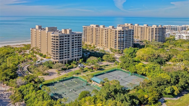 aerial view with a water view and a view of the beach