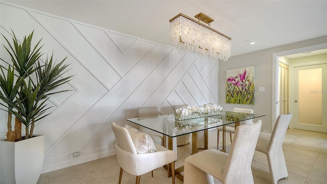 dining area with light tile patterned floors and a notable chandelier