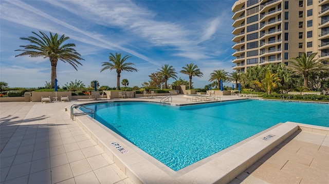 view of pool featuring a patio area