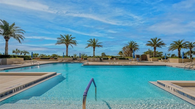 view of pool featuring a patio area