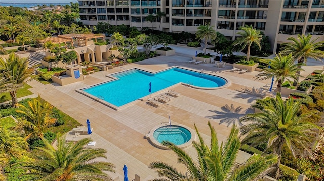 view of swimming pool featuring a patio area