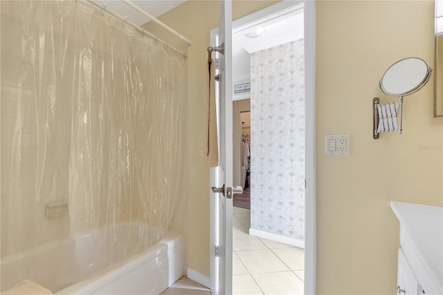 bathroom with tile patterned flooring and shower / bath combination with curtain