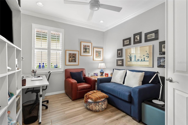 office featuring ceiling fan, light wood-type flooring, and ornamental molding