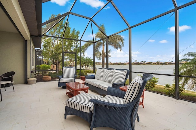 view of patio / terrace featuring outdoor lounge area and glass enclosure