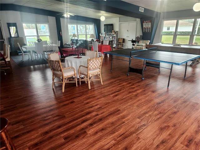 rec room with wood-type flooring and ceiling fan