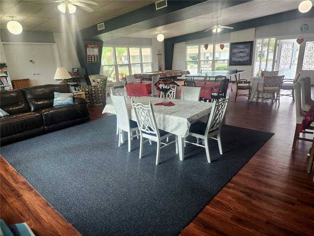 dining room with dark hardwood / wood-style floors and ceiling fan