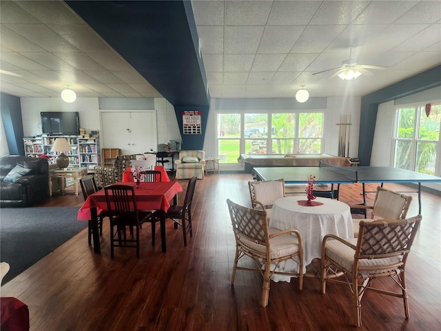 dining room featuring ceiling fan and hardwood / wood-style flooring