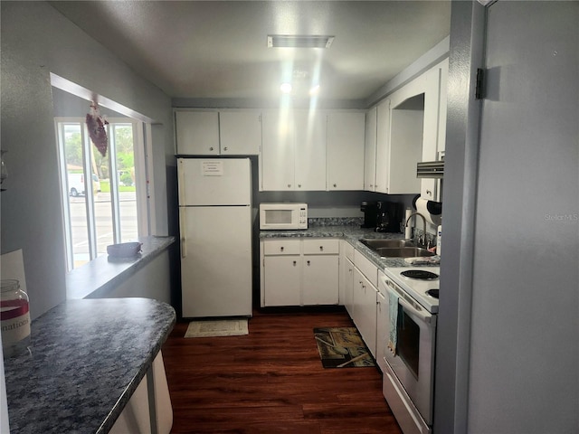 kitchen with white cabinetry, dark hardwood / wood-style flooring, white appliances, and sink