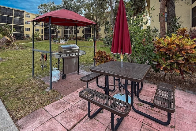 view of patio featuring a gazebo and area for grilling