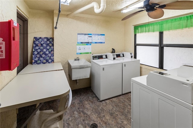 laundry area with washer and dryer, sink, and ceiling fan