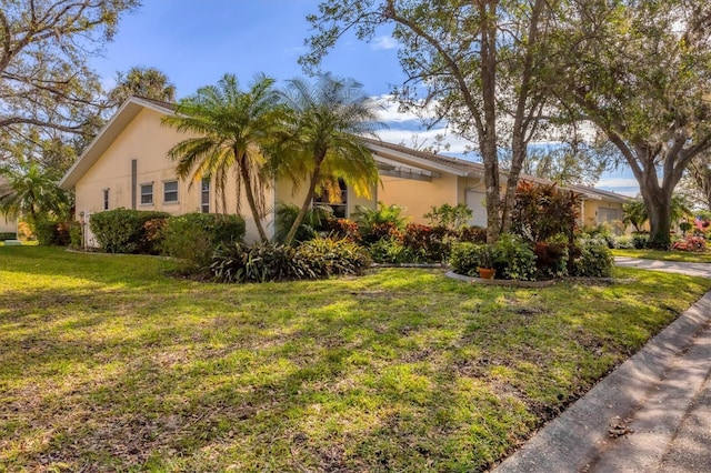 view of property exterior featuring a yard