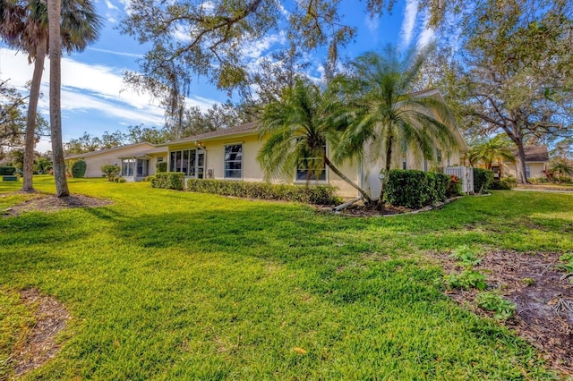 exterior space with a yard