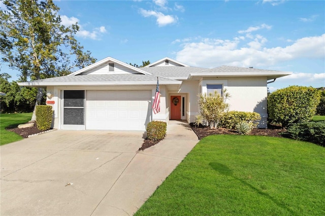 ranch-style home featuring a front yard and a garage