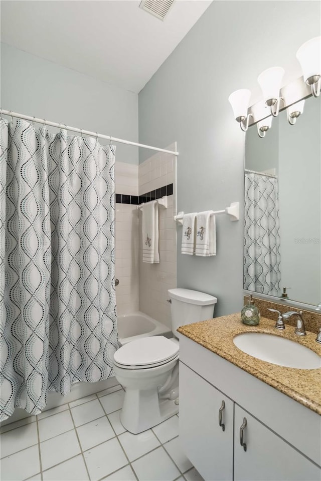 full bathroom with tile patterned flooring, shower / bath combination with curtain, vanity, and toilet