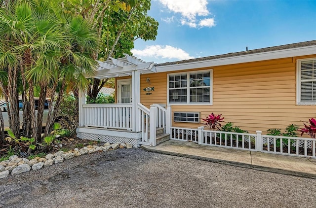 view of front of home with a pergola