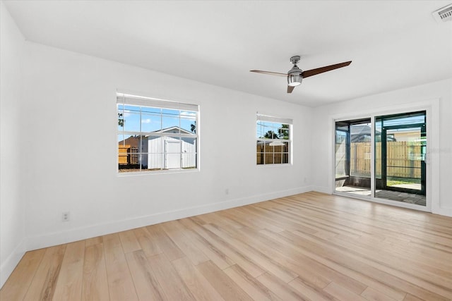 unfurnished room featuring ceiling fan and light hardwood / wood-style floors