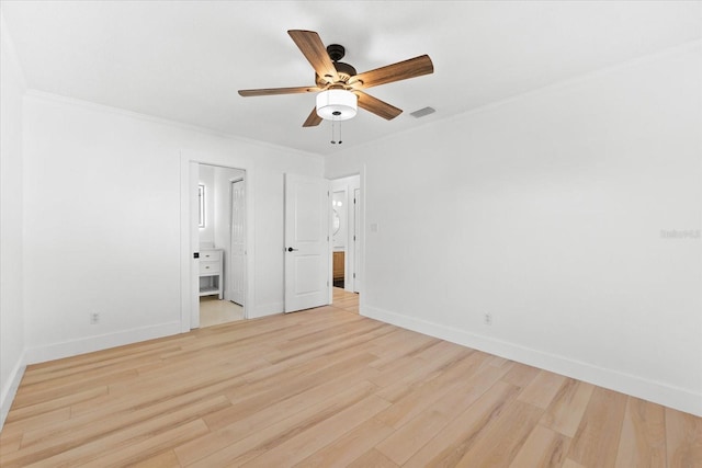 unfurnished bedroom featuring ensuite bathroom, light hardwood / wood-style flooring, ceiling fan, and ornamental molding