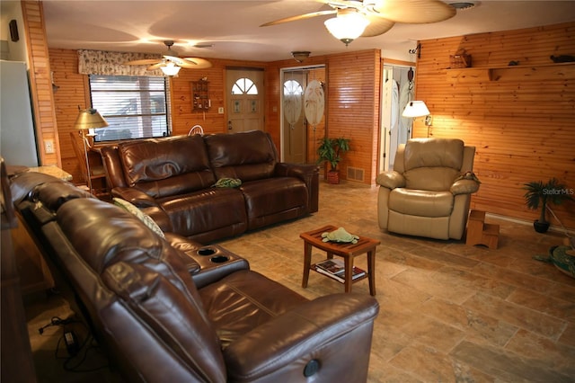 living room with wooden walls