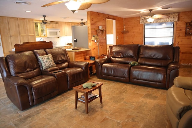 living room featuring wooden walls