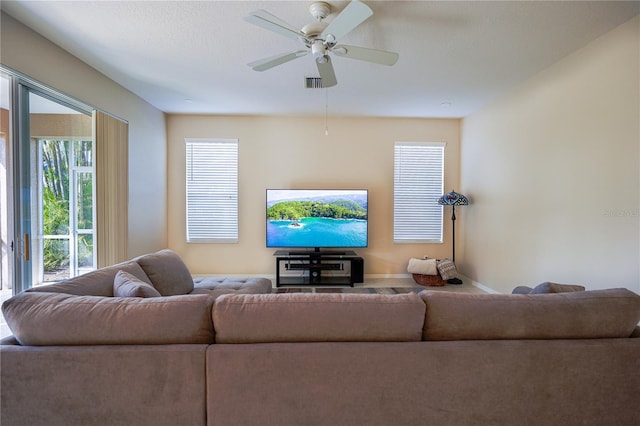 living room featuring ceiling fan