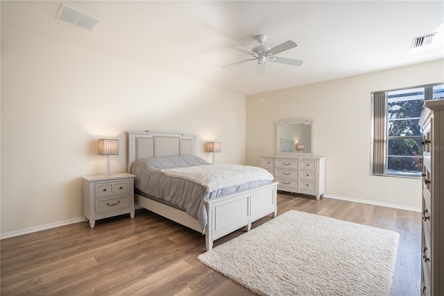 bedroom featuring ceiling fan and hardwood / wood-style flooring