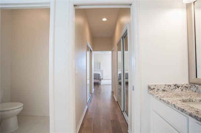 hallway featuring hardwood / wood-style floors