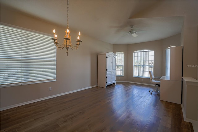 unfurnished office featuring dark hardwood / wood-style flooring and ceiling fan with notable chandelier