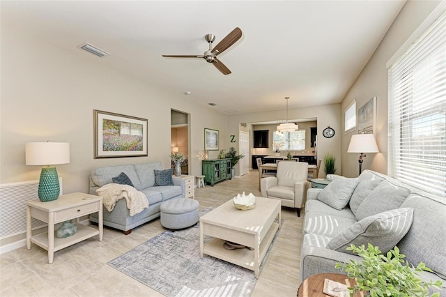 living room with ceiling fan