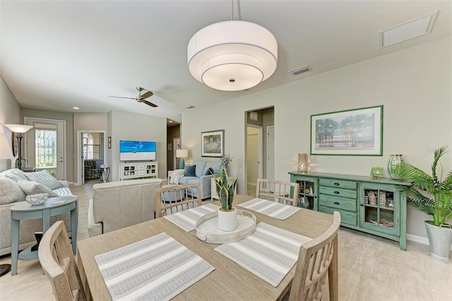 dining space with ceiling fan