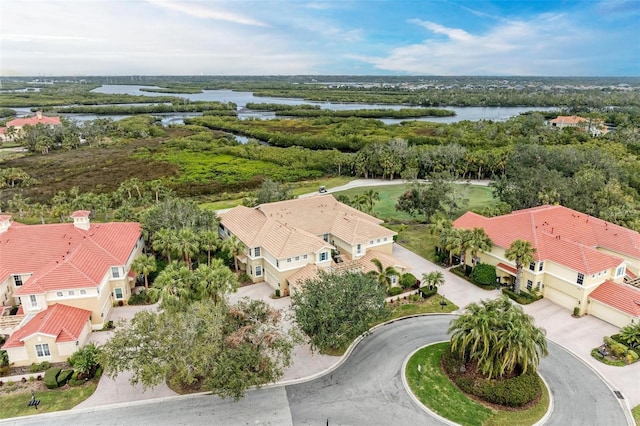 bird's eye view with a water view