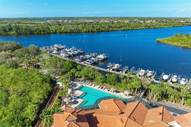 birds eye view of property with a water view