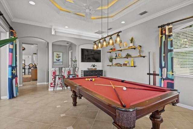 recreation room with tile patterned flooring, a tray ceiling, ornamental molding, and pool table